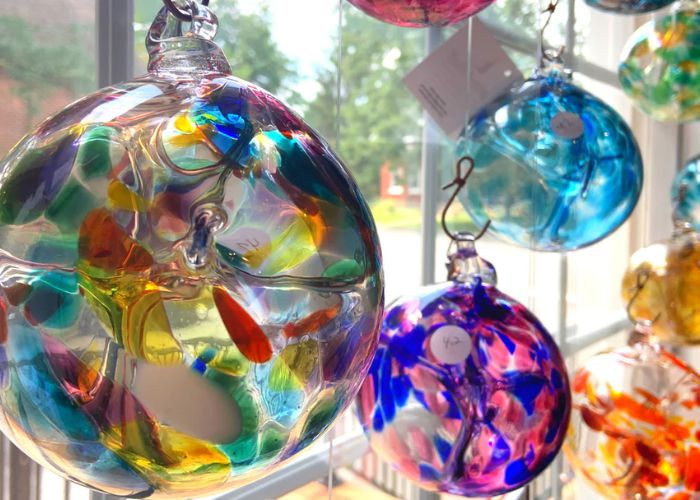 What are some creative uses for decorative glass balls in home decor?